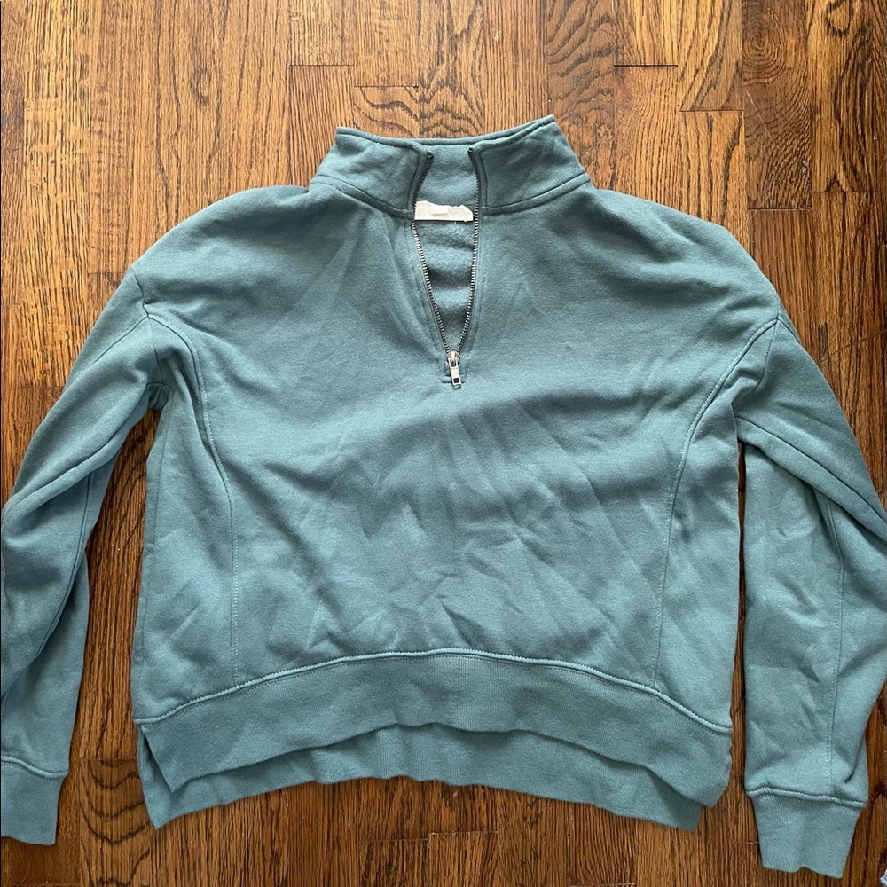 turquoise quarter zip